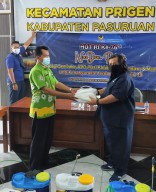 Partai Nasdem Pasuruan Bagi-bagi Makanan dan APD di Pusuruan