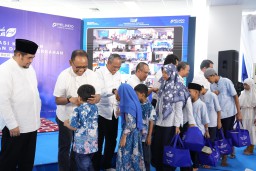 Pelindo Terminal Petikemas Beri Santunan untuk Ribuan Anak Yatim dan Bantuan Sarana Ibadah